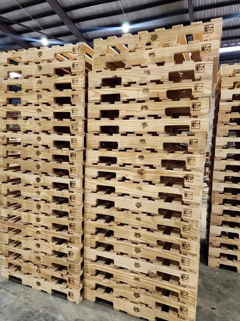 Pallet stacks carrying the ISPM 15 TT-08 HT stamp