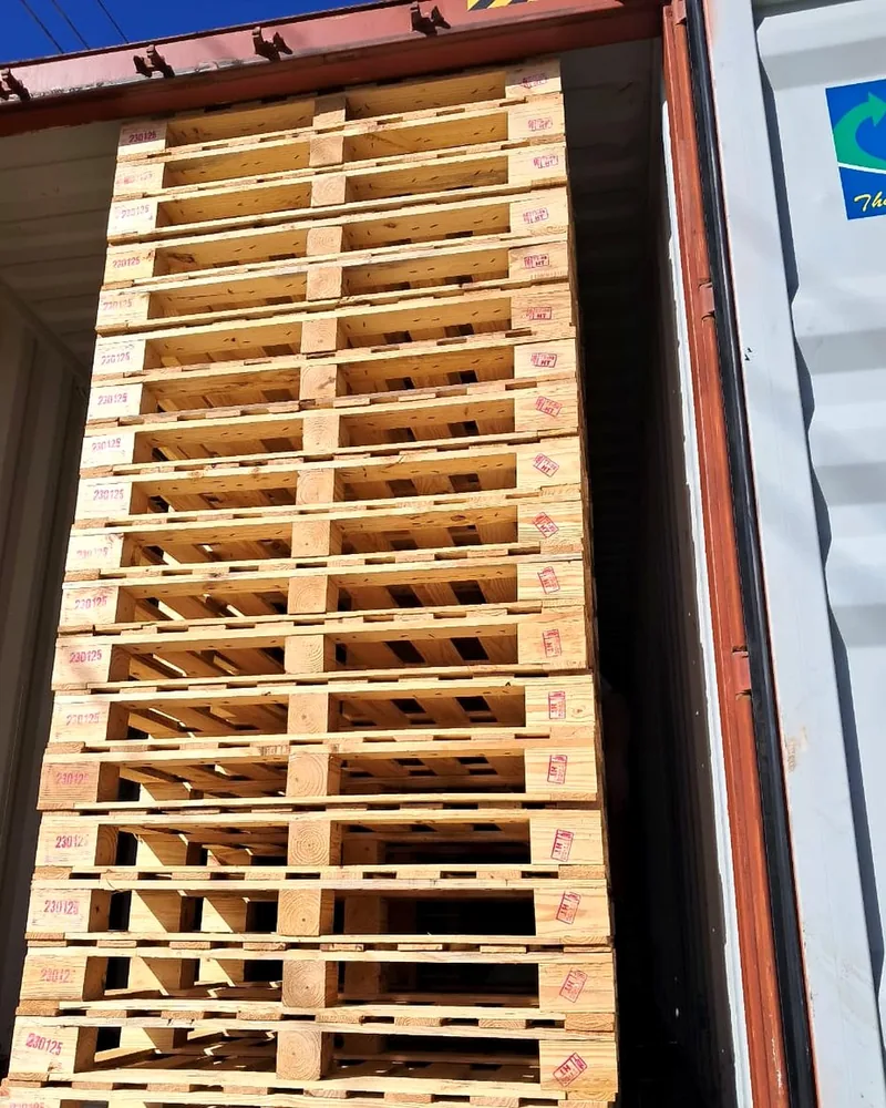 Heat treated pallets loaded neatly in an export container